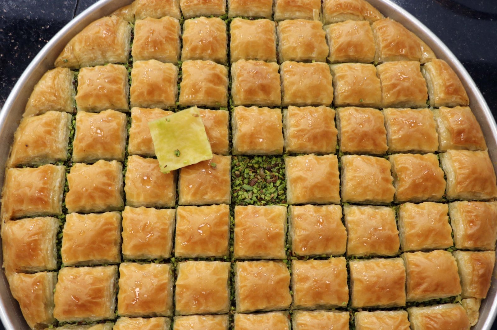 The baklava masters in Gaziantep are working overtime to meet the demands that have arisen due to the Qurban Bayram, Gaziantep, Türkiye, June 23, 2023. (DHA Photo)