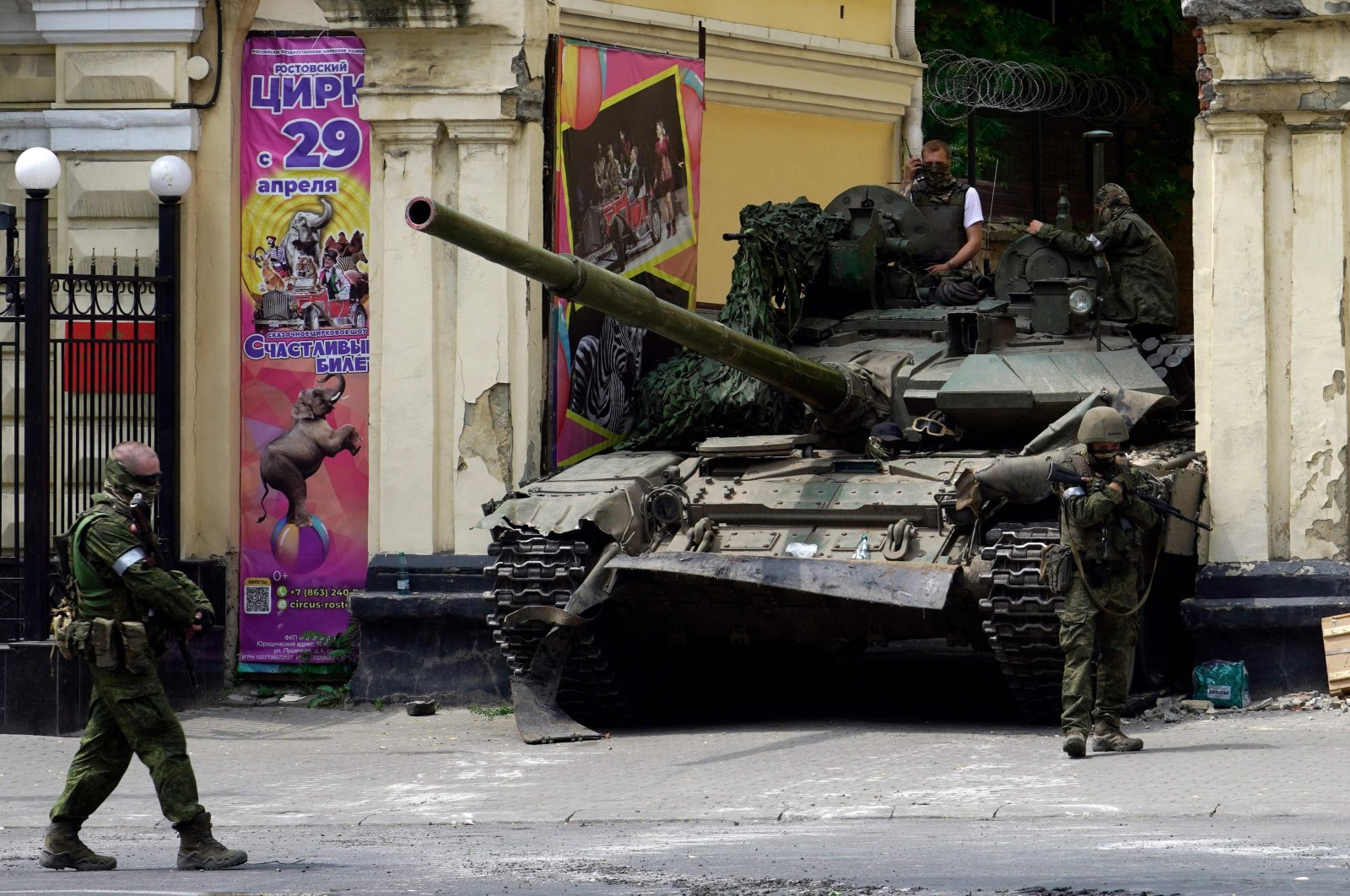 Members of Wagner group patrol in an area near a tank outside a circus building in the city of Rostov-on-Don, Russia, June 24, 2023. (AFP Photo)