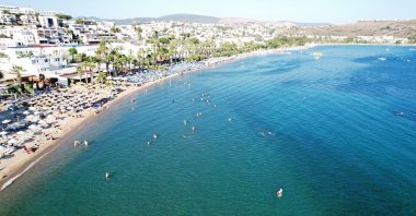 Tourists flock to the coastal areas of the country for the bayram holiday, Bodrum, Türkiye, June 25, 2023. (IHA Photo)