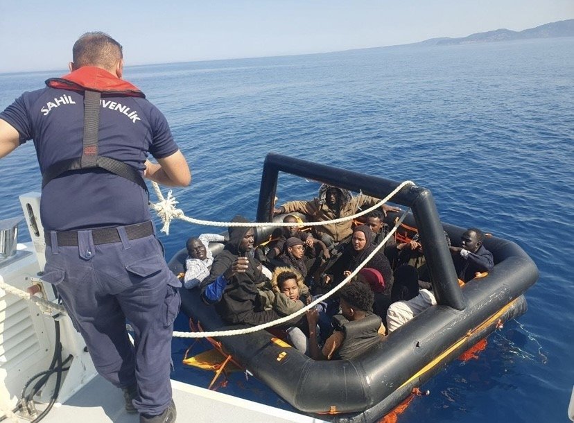 Turkish Coast Guard help irregular migrants off the coast of Ayvacık, Çanakkale, western Türkiye, June 25, 2023. (İHA Photo)
