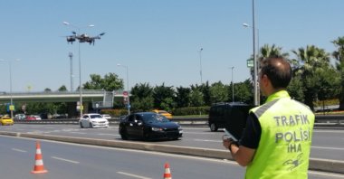 A traffic police officer is pictured monitoring traffic via drone, Istanbul, Türkiye, June 26, 2023. (AA Photo)
