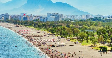 People are seen on a beach in the Mediterranean resort city of Antalya, Türkiye, Aug. 18, 2019. (iStock Photo)