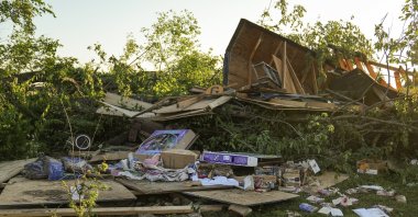 Debris is left behind after a reported tornado touched down in several areas of Greenwood, Ind., Sunday afternoon, June 25, 2023. (Jenna Watson/The Indianapolis Star via AP)