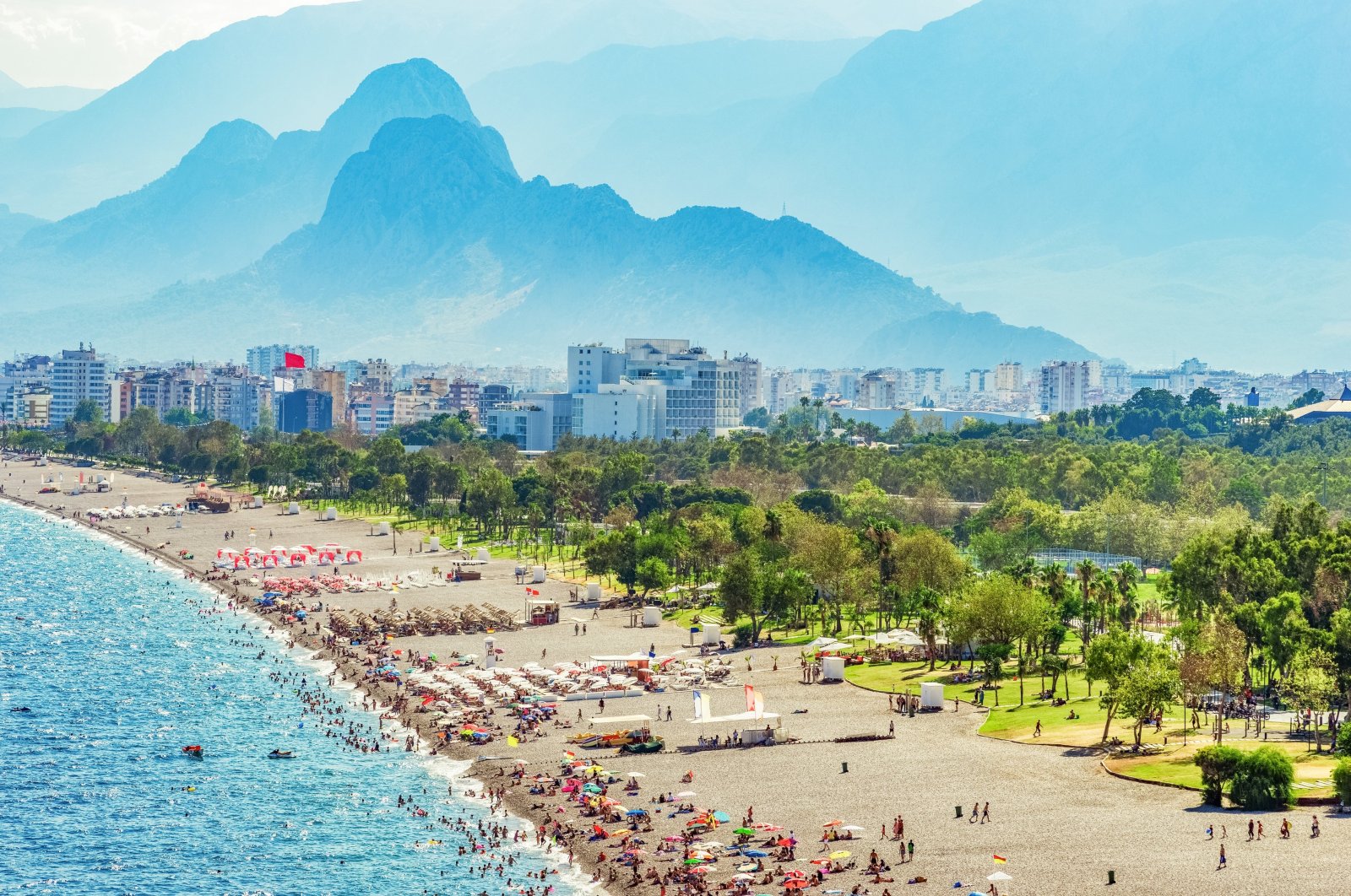 People are seen on a beach in the Mediterranean resort city of Antalya, Türkiye, Aug. 18, 2019. (iStock Photo)