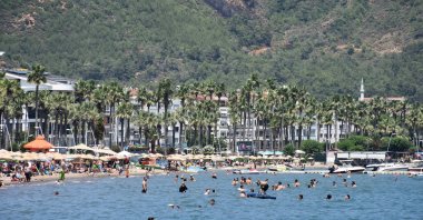 Tourists are seen in one of the country&#039;s most important tourism spots, Fethiye, Türkiye, June 27, 2023. (AA Photo)