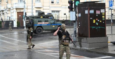 Fighters of Wagner private mercenary group are deployed in a street near the headquarters of the Southern Military District in the city of Rostov-on-Don, Russia, June 24, 2023. (Reuters Photo)
