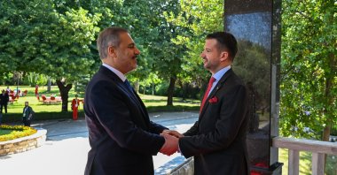 Foreign Minister Hakan Fidan (L) shakes hands with Montenegro’s President Jakov Milatovic (R) on the sidelines of the South-East European Cooperation Process (SEECP) leaders' summit in the capital Podgorica, Montenegro, June 27, 2023. (AA Photo)