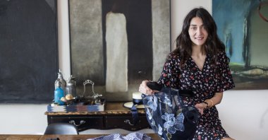 Aslı Filinta poses with some of her work, June 14, 2017. (Photo courtesy of Şamdan Magazine)