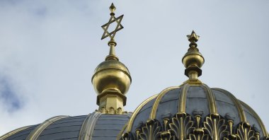 Clouds cover the sky over the Star of David on top of the 'New Synagogue' in central Berlin, Germany, June 27, 2023. (AP Photo)