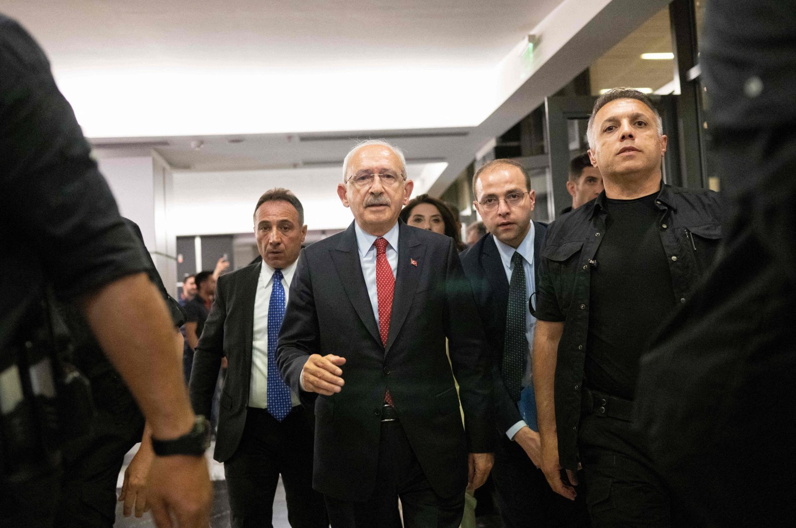Republican People&#039;s Party (CHP) chair and presidential candidate of the main opposition alliance, Kemal Kılıçdaroğlu (C) walks after his speech at the CHP headquarters in Ankara, Türkiye, May 28, 2023. (AFP Photo)