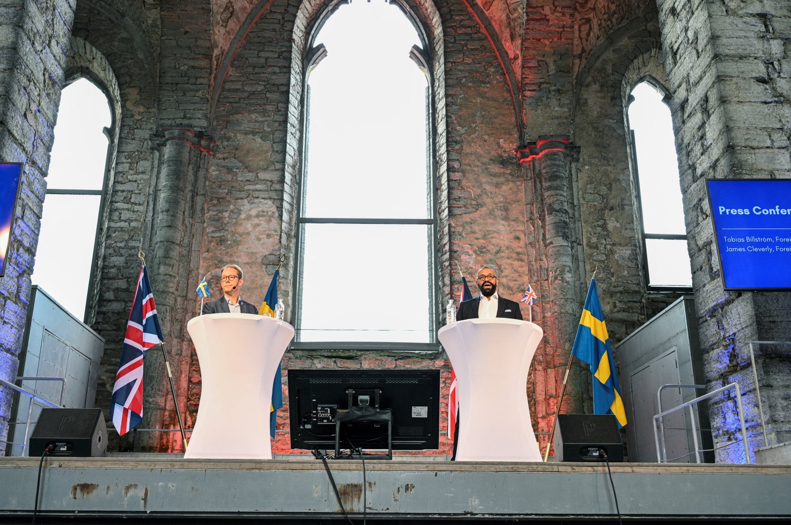 Swedish Foreign Minister Tobias Billstrom and British Foreign Minister James Cleverly hold a news conference at Sankt Nicolai Church Ruins, in Visby, Sweden June 27, 2023. (Reuters Photo)
