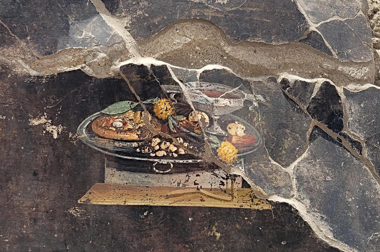 Pizza atau tidak?  Lukisan kuno ditemukan dengan hidangan khas Italia