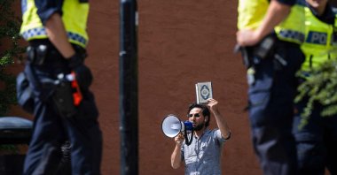 Salwan Momika protests outside a mosque in Stockholm on June 28, 2023, during the Eid al-Adha holiday. (AFP Photo)