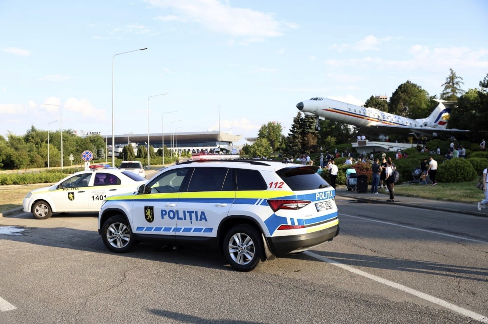 Passengers are evacuated from Chisinau airport in Moldova Friday, June 30, 2023. (AP Photo)