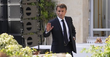 French President Emmanuel Macron arrives to inaugurate an exhibition dedicated to produces made in France, at the Elysee palace in Paris, France, June 30, 2023.  (EPA Photo)