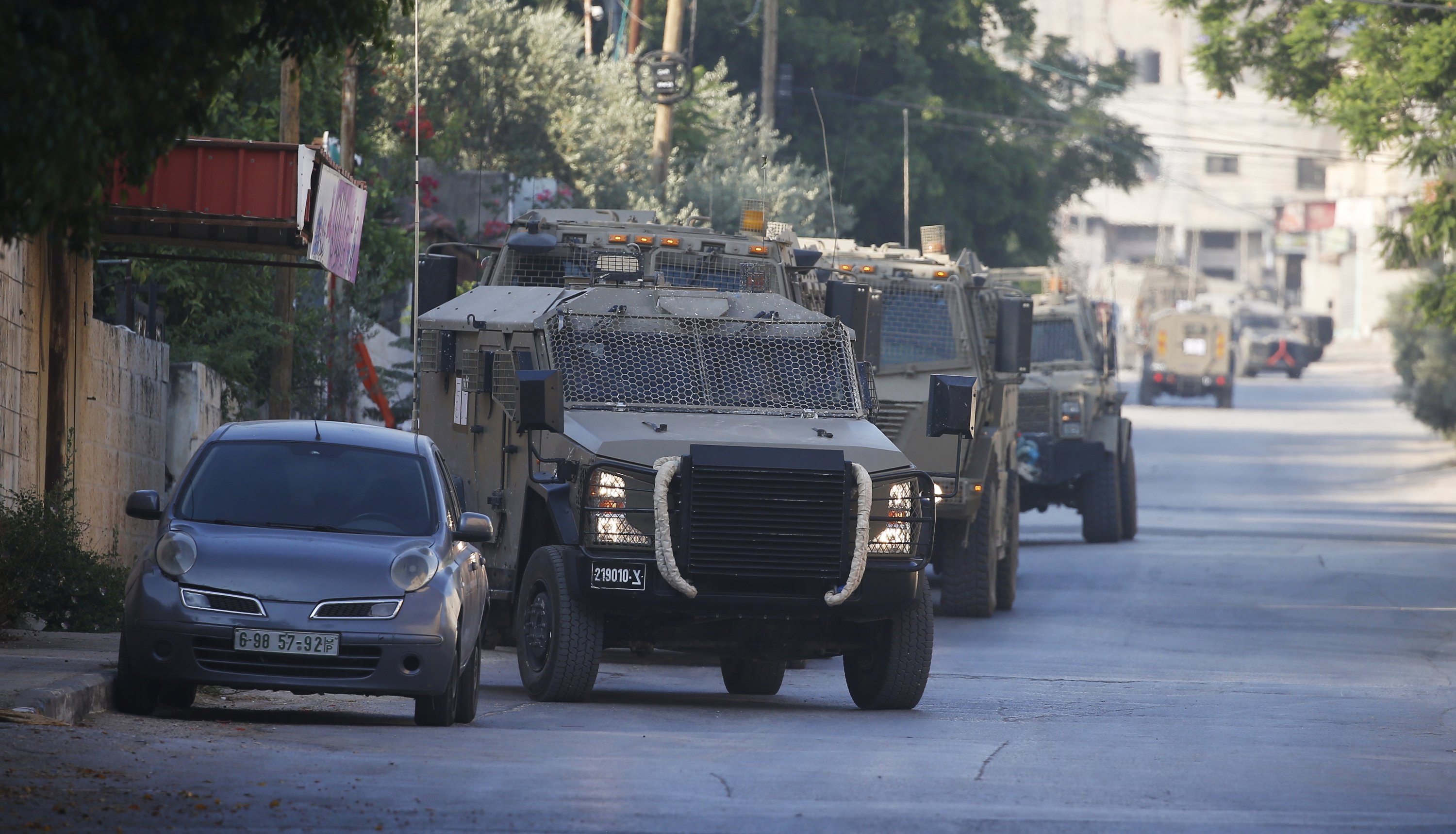 Israeli military vehicles maneuver during a raid in Jenin, occupied West Bank, July 3, 2023. (EPA Photo)