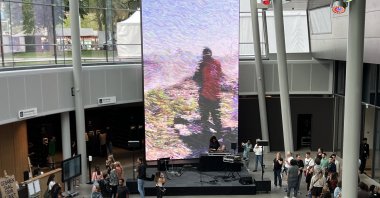 Turkish artist Ahmet Emin Batman&#039;s earthquake-themed video installation artwork titled &quot;Memento Diem&quot; was showcased at Amsterdam&#039;s famous Van Gogh Museum during the &quot;Vincent Friday&quot; event, Amsterdam, the Netherlands, June 30, 2023. (AA Photo)