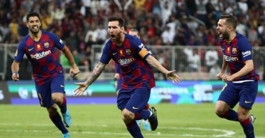 Barcelona's Lionel Messi (C) celebrates with Jordi Alba (R) and Luis Suarez after scoring against Atletico Madrid at the King Abdullah Sports City, Jeddah, Saudi Arabia, Jan. 9, 2020. (Reuters Photo)  