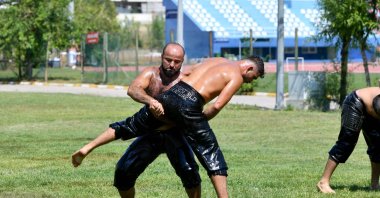 Muratpaşa Municipality's Chief Wrestler Orhan Okulu (L) in action ahead of the historical Kırkpınar Oil Wrestling, Antalya, Türkiye, June 30, 2023. (IHA Photo)