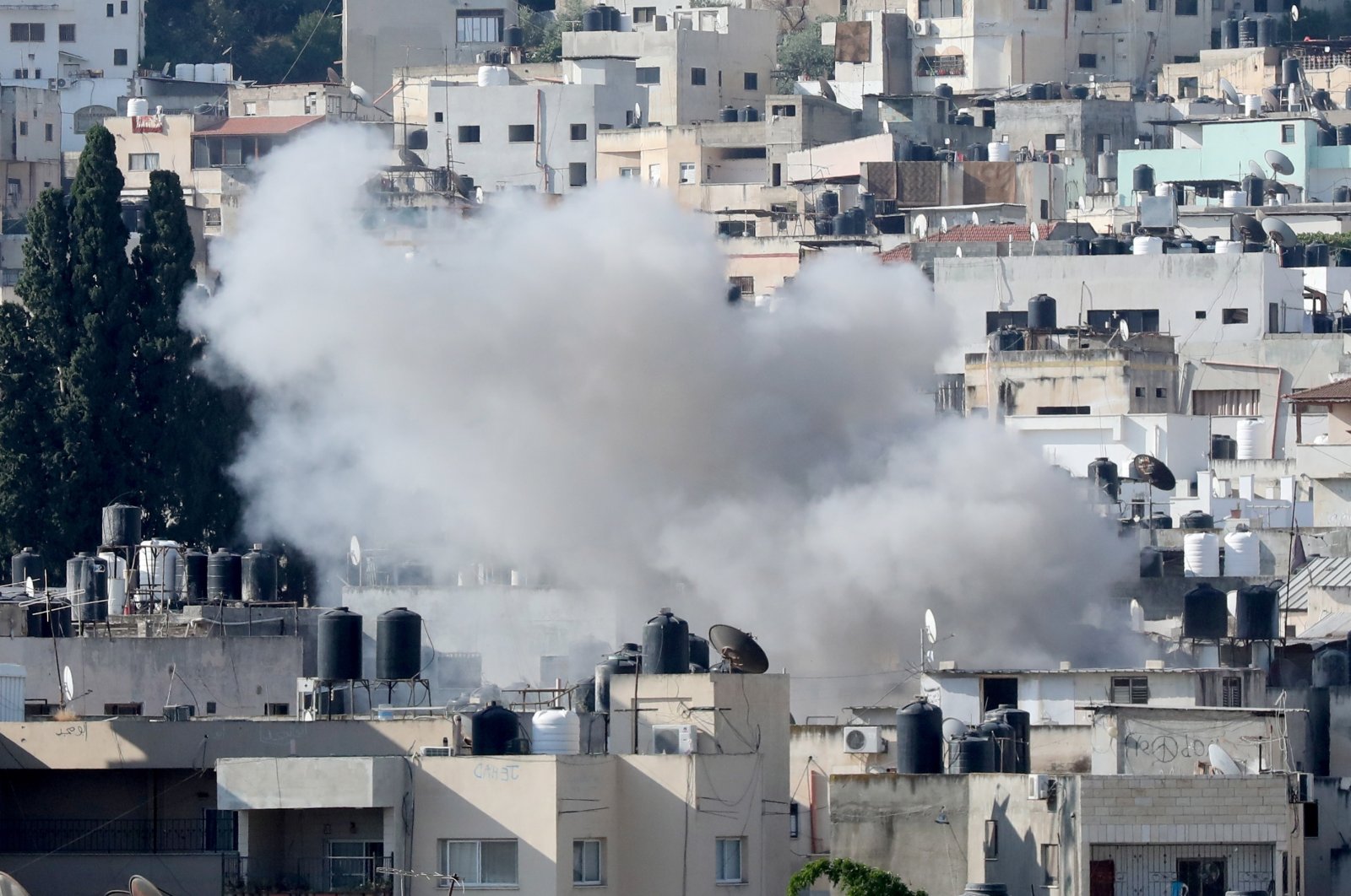 Smoke billows during an Israeli military operation in Jenin, West Bank, July 3, 2023. (EPA Photo)