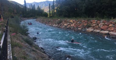The group of people rafts in the Barhal River in the Yusufeli district of northeastern Artvin province, Türkiye, July 3, 2023. (AA Photo)