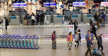 Passengers walk next to check-in counters at the O.R. Tambo International Airport, in Johannesburg, South Africa, July 3, 2023. (Reuters Photo)