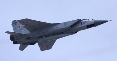A Russian MiG-31 fighter jet equipped with a Kinzhal hypersonic missile flies over Red Square during a rehearsal for a flypast, part of a military parade marking the anniversary of the victory over Nazi Germany in World War Two, in central Moscow, Russia May 7, 2022. (Reuters File Photo)