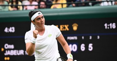 Tunisia's Ons Jabeur celebrates after winning a point against Poland's Magdalena Frech during their women's singles tennis match on the second day of the 2023 Wimbledon Championships at the All England Tennis Club in Wimbledon, London, U.K., July 4, 2023. (AFP Photo)