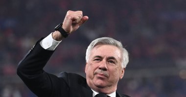 Real Madrid's Italian coach Carlo Ancelotti gestures as he celebrates his team's victory during the UEFA Champions League final football match between Liverpool and Real Madrid at the Stade de France in Saint-Denis, Paris, France, May 28, 2022. (AFP Photo)