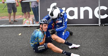 Spanish rider Luis Leon Sanchez of Astana Qazaqstan Team receives treatment following a crash toward the end of the 4th stage of the Tour de France 2023, France, July 4, 2023. (EPA Photo)
