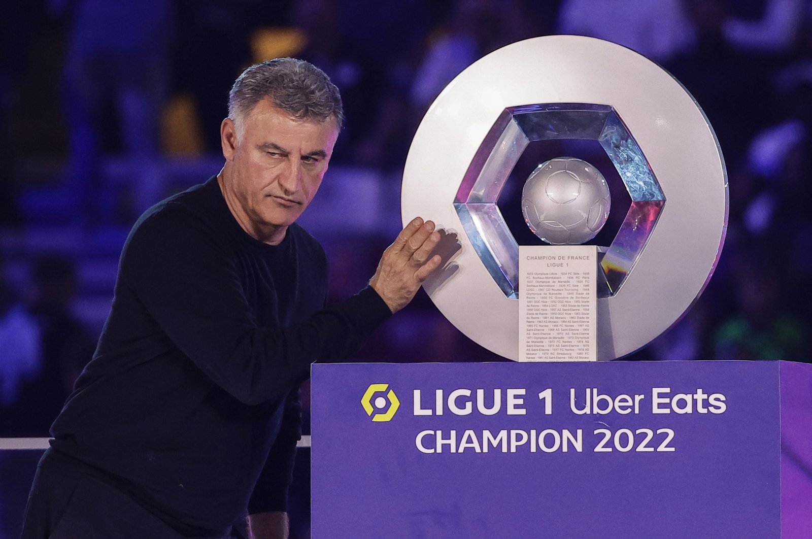 Paris Saint-Germain head coach Christophe Galtier poses with the French Ligue 1 trophy that the club won, during a ceremony following the French Ligue 1 match between Paris Saint-Germain and Clermont Foot 63, Paris, France, June 3, 2023. (EPA Photo)