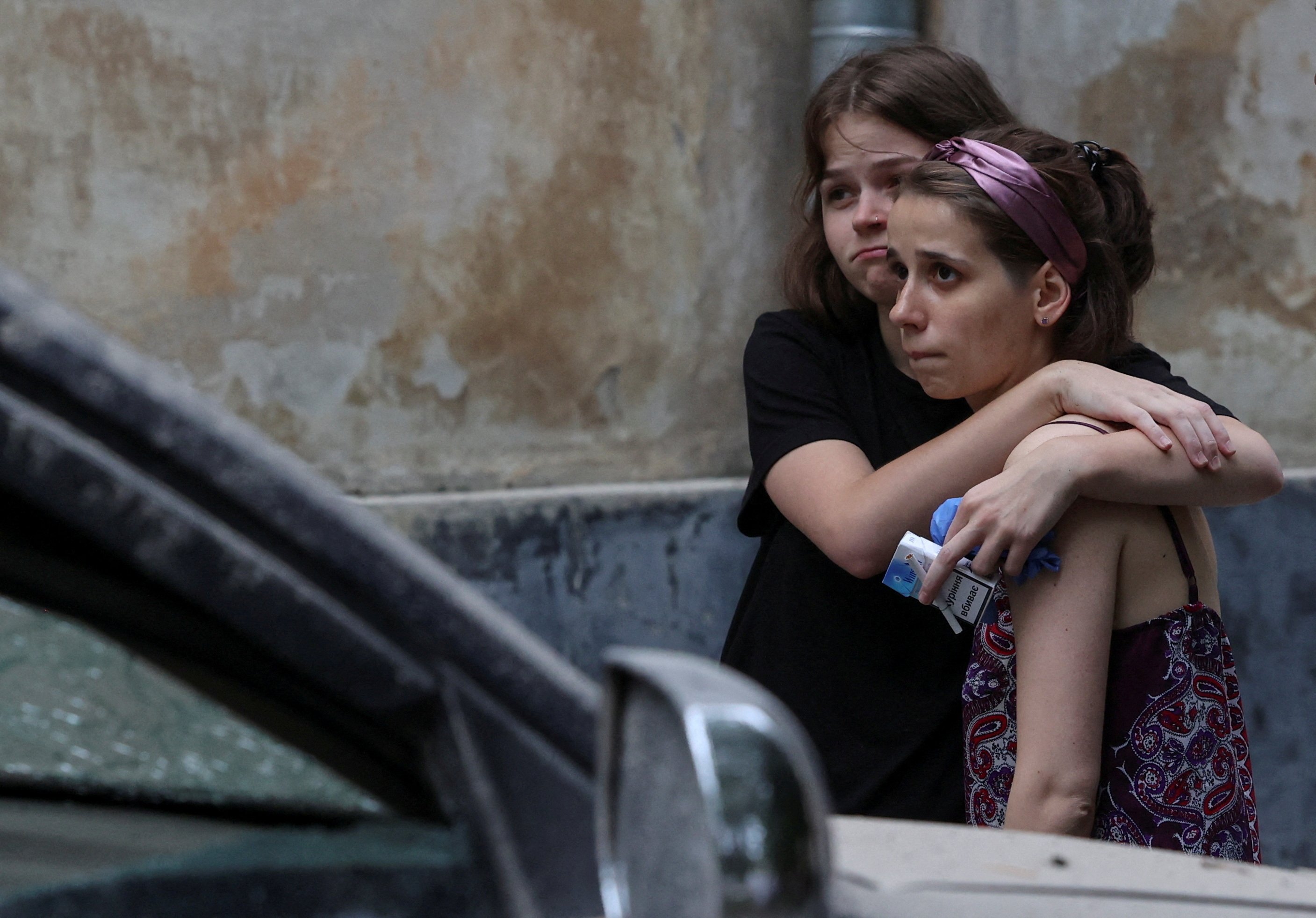 Local residents react at a site of a residential building hit by a Russian missile strike, Lviv, Ukraine, July 6, 2023. (Reuters Photo)