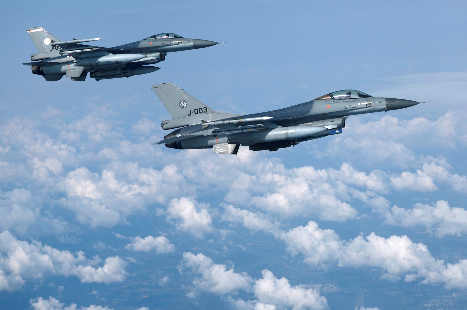 Netherlands&#039; Air Force F-16 fighter jets fly during a media day illustrating how NATO Air Policing safeguards the allies&#039; airspace in the northern and northeastern region of the alliance, July 4, 2023. (Reuters Photo)