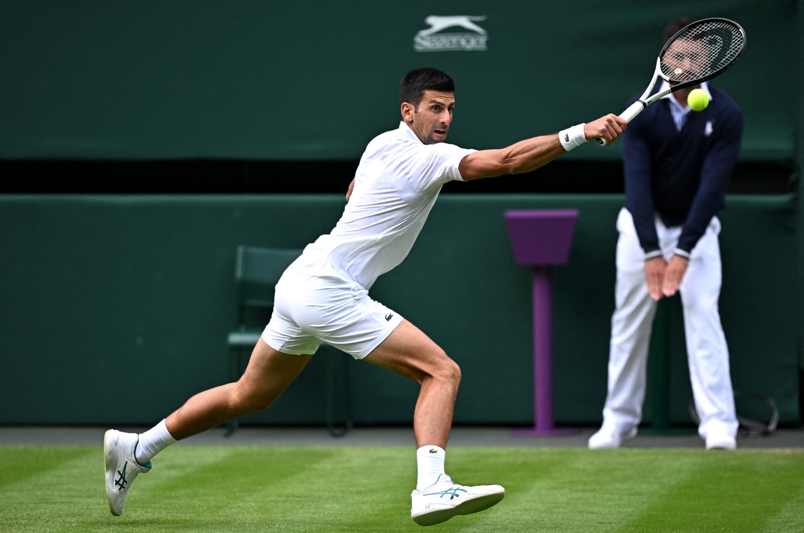 Serbia&#039;s Novak Djokovic in action during his second round match against Australia&#039;s Jordan Thompson at Wimbledon&#039;s All England Lawn Tennis and Croquet Club, London, UK., July 5, 2023. (Reuters Photo) 