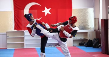 Turkish taekwondo athlete Nafia Kuş (R) trains ahead of the 2024 Paris Olympics, Istanbul, Türkiye, July 4, 2023. (AA Photo)