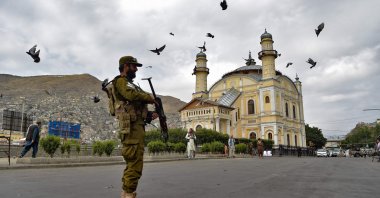 A Taliban security personnel stands guard outside the Shah-e Doh Shamshira mosque ahead of the Muslim festival of Qurban Bayram, also known as, Eid al-Adha, in Kabul, Afghanistan, June 28, 2023. (AFP Photo)