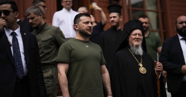 Ukrainian President Volodymyr Zelenskyy (C-L), stands next to Ecumenical Patriarch Bartholomew I, the spiritual leader of the world's Orthodox Christians, at the Patriarchal Church of Saint George in Istanbul, Türkiye, July 8, 2023. (AP Photo)