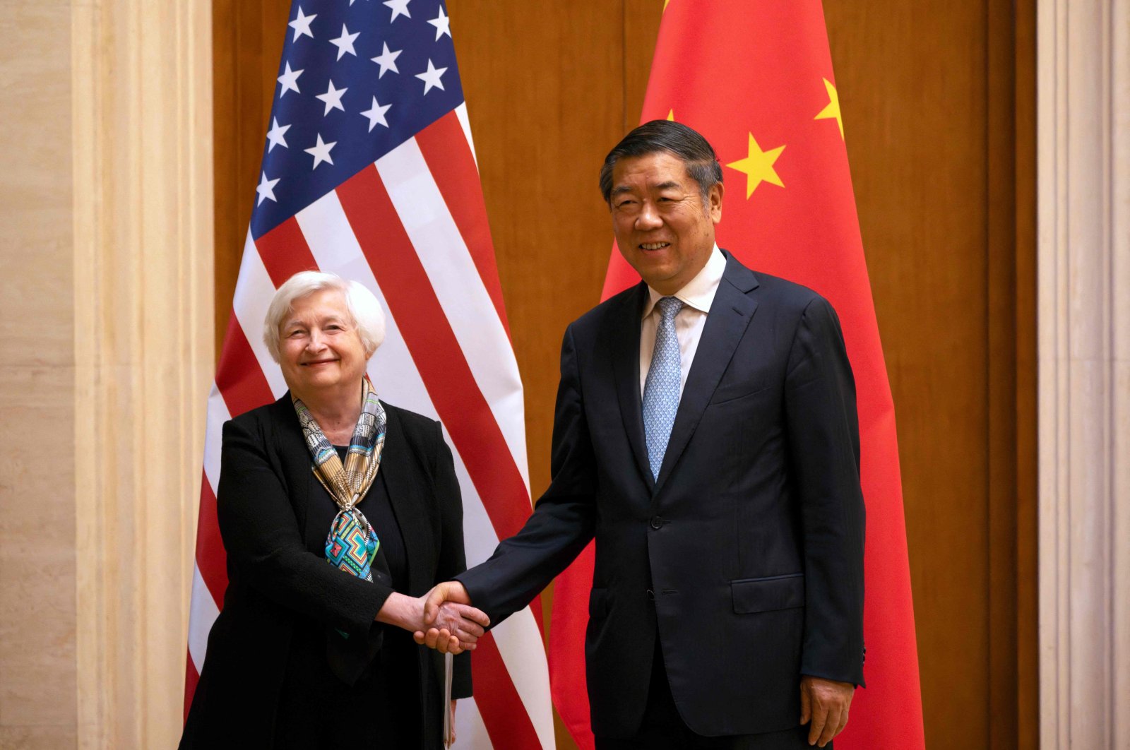 U.S. Treasury Secretary Janet Yellen (L) shakes hands with Chinese Vice Premier He Lifeng during a meeting at the Diaoyutai State Guesthouse in Beijing, China, July 8, 2023. (AFP Photo)