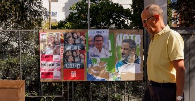 A man walks past electoral posters ahead of the July 23 snap election, Ronda, Spain, July 7, 2023. (Reuters Photo)