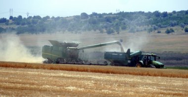 Ukrainian farmers harvest grain in the Odessa region amid the Russian invasion, south Ukraine, June 23, 2023. (EPA Photo)
