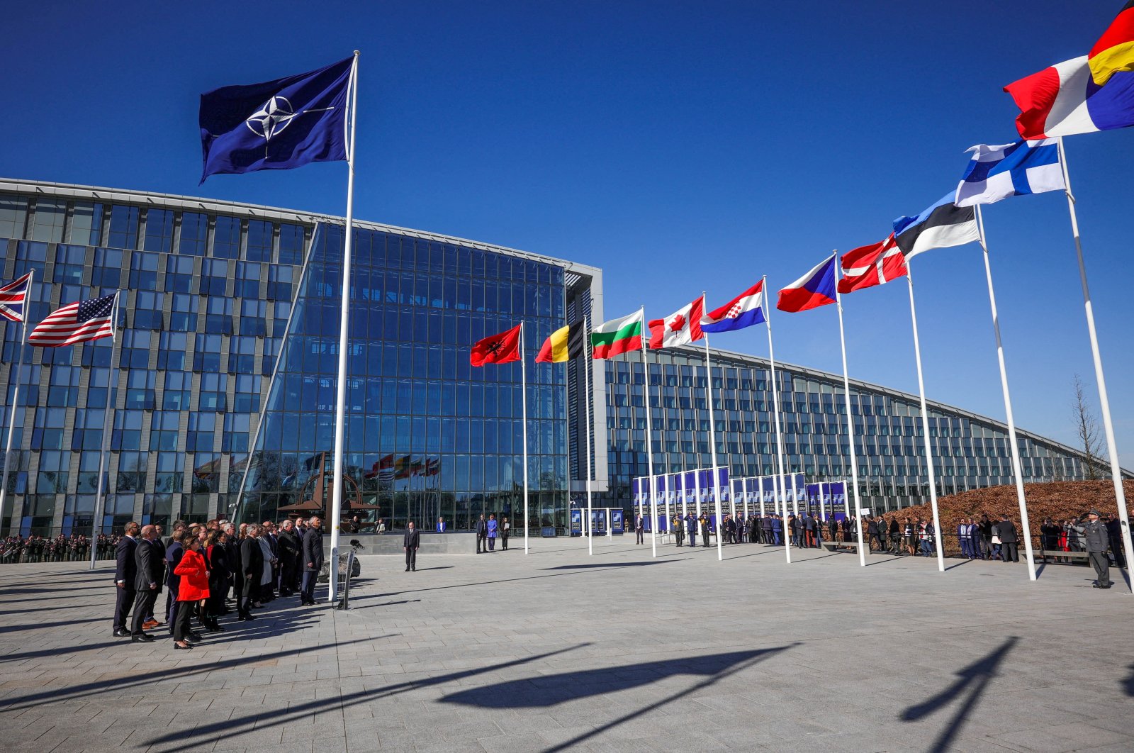 Officials attend a flag-raising ceremony for Finland&#039;s accession during NATO foreign ministers&#039; meeting at NATO headquarters in Brussels, Belgium, April 4, 2023. (Reuters Photo)