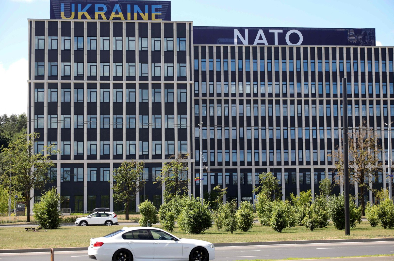 Banners reading "Ukraine" and "NATO" are seen at the NATO summit venue in Vilnius ahead of the July 11-12 NATO summit, Lithuania, July 9, 2023. (AFP Photo)