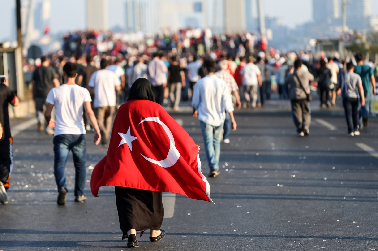 People are seen protesting the coup attempt on the Democracy and National Unity Bridge, Istanbul, July 12, 2021. (AA Photo)