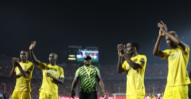 Zimbabwe national team players applaud their fans after the group A football match against Uganda at the Africa Cup of Nations at Cairo International Stadium in Cairo, Egypt, June 26, 2019. (AP Photo)