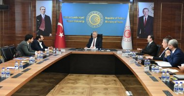 Türkiye’s Trade Minister Ömer Bolat (C) meets with Mohamed Hassan Alsuwaidi (L), the chief executive officer of Abu Dhabi Development Holding (ADQ), at the ministry's headquarters, in Ankara, Türkiye, July 3, 2023. (Twitter Photo: @omerbolatTR)