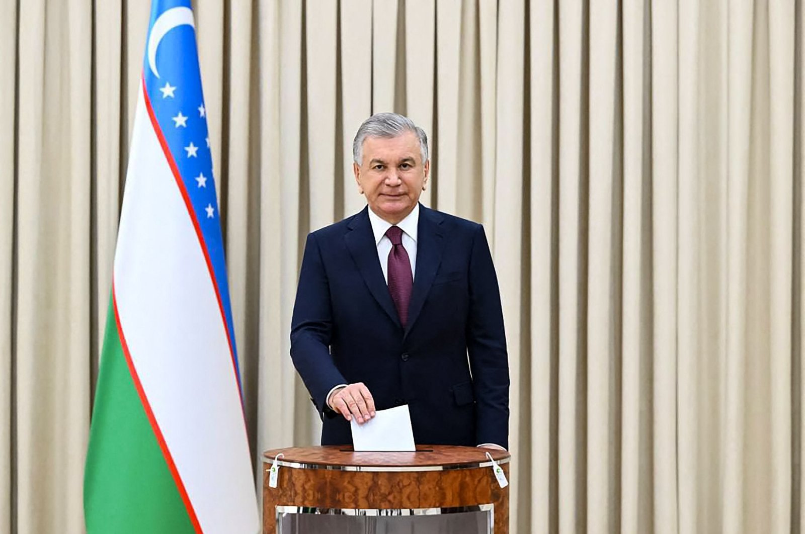 Uzbekistan&#039;s President and presidential candidate Shavkat Mirziyoyev votes in the country&#039;s presidential election in Tashkent, July 9, 2023. ( Uzbek Presidential Press Service Handout via AFP)