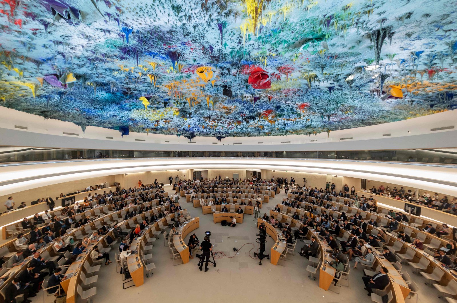 A general view of the Human Rights and Alliance of Civilizations Room, with the ceiling painted by Spanish painter Miquel Barcelo, at the opening of the 53rd U.N. Human Rights Council in Geneva, on June 19, 2023. (AFP Photo)