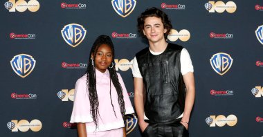 Calah Lane (L) and Timothee Chalamet, promoting the movie "Wonka," attend a Warner Bros. presentation during CinemaCon, the official convention of the National Association of Theatre Owners, in Las Vegas, Nevada, U.S., April 25, 2023. (Reuters Photo)
