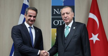 President Recep Tayyip Erdoğan (R) meets with Greek Prime Minister Kyriakos Mitsotakis during a NATO leaders summit in Vilnius, Lithuania, July 12, 2023. (Reuters Photo)