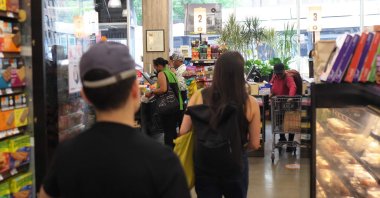 People shop at a market in the Prospect Lefferts Gardens neighborhood in the Brooklyn borough of New York City, U.S., June 12, 2023. (AFP Photo)
